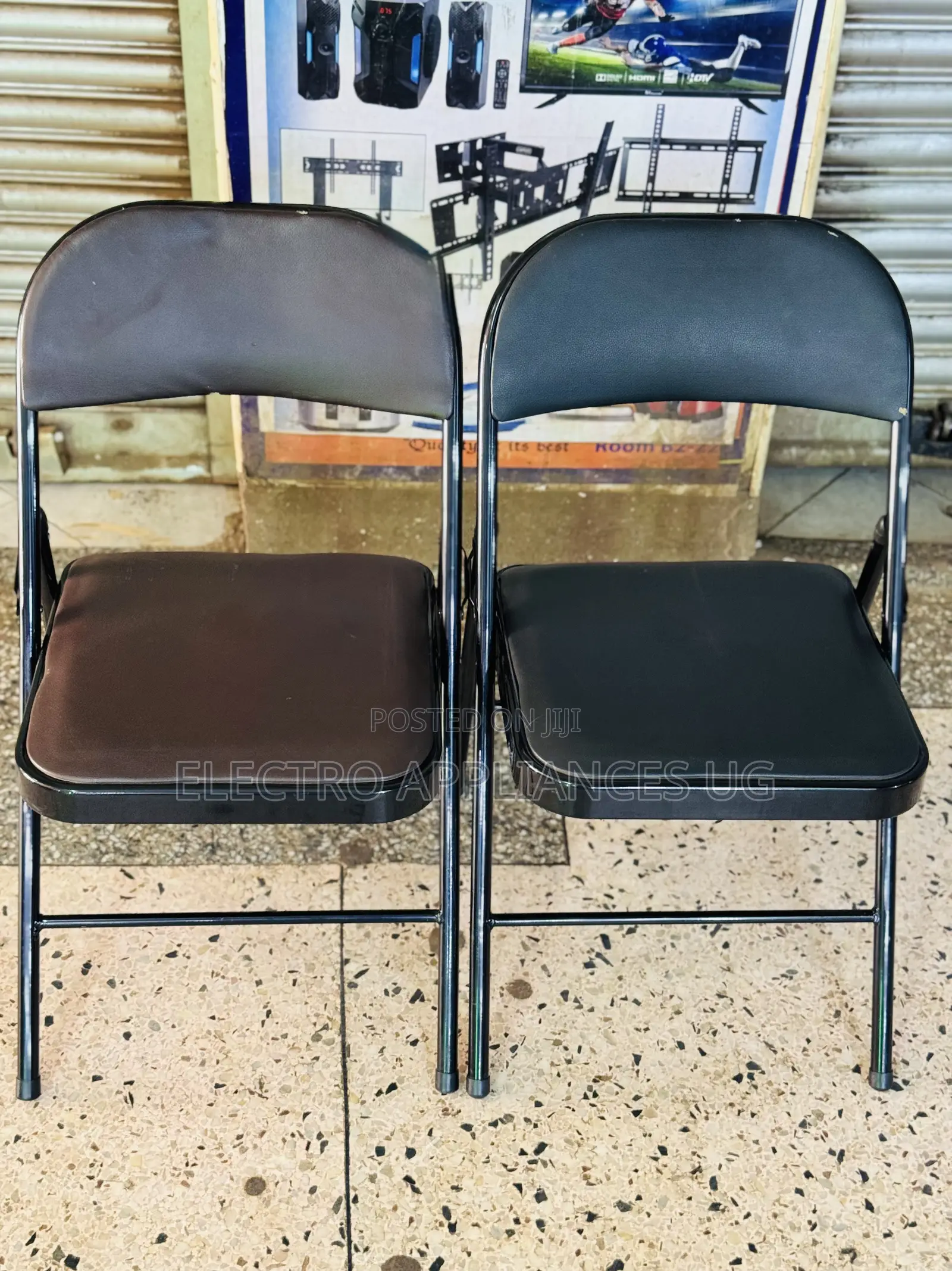 Black Padded Metal Folding Chair.
