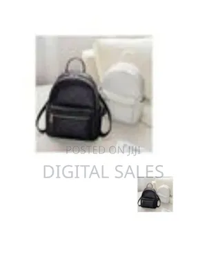 Chic Embossed Monogram Mini Backpack