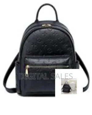 Chic Embossed Monogram Mini Backpack