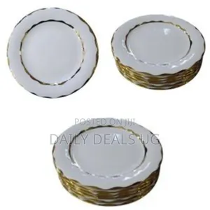 6 Piece Set of Elegant Ceramic Plates With a Gold Rim