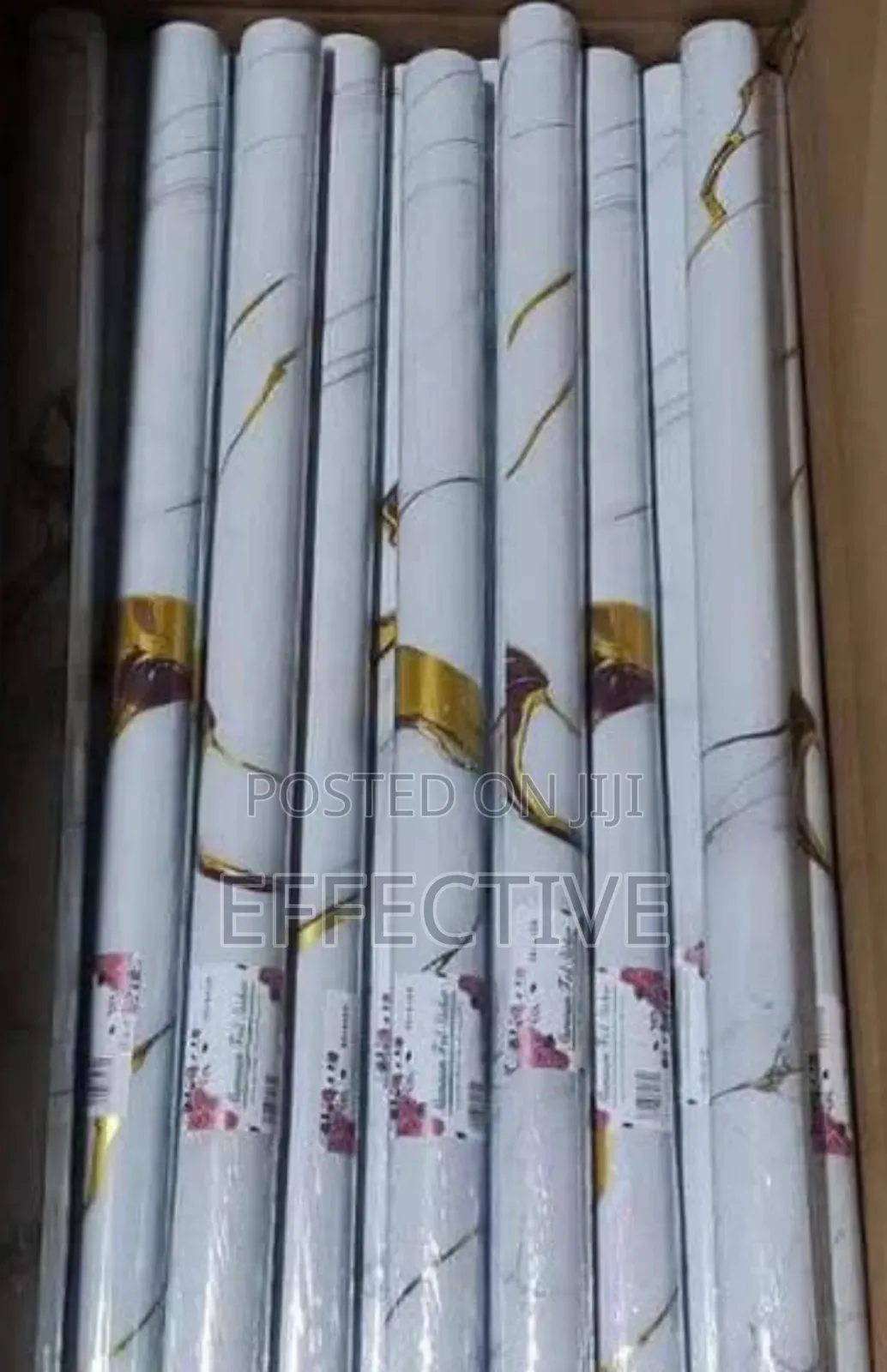 Rolls of Self-Adhesive Marble Wallpaper.