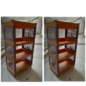 A Four-Tier Plastic Kitchen Storage Rack or Trolley