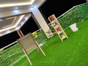 Balcony Flowers and Grass Carpet