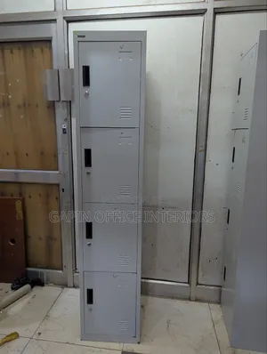 Second Hand 4 Locker Filing Cabinet, Each Drawer With Its Own Kéy