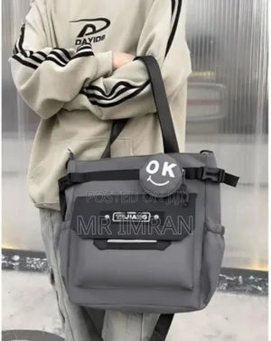 Multi-Pocket Tote Bag Made of Water-Resistant Nylon Material.