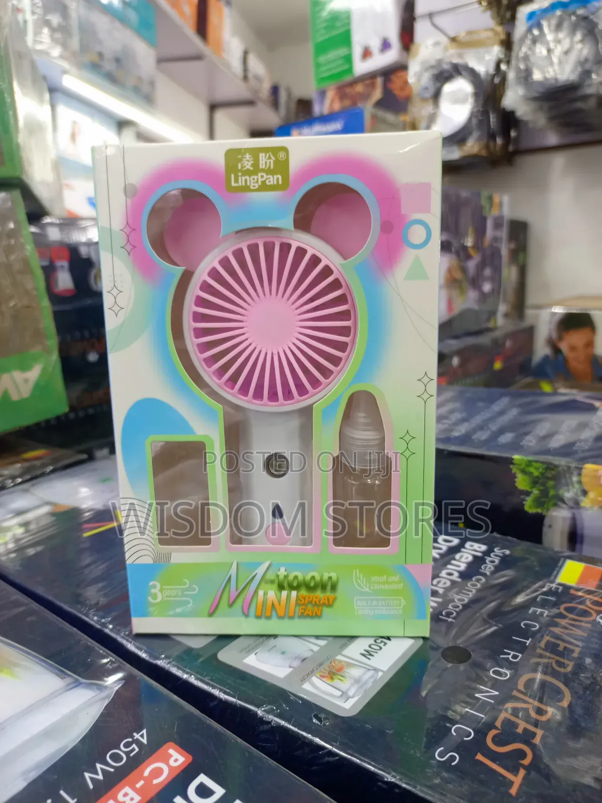 Portable Mini Fan With a Mist Spray Function.