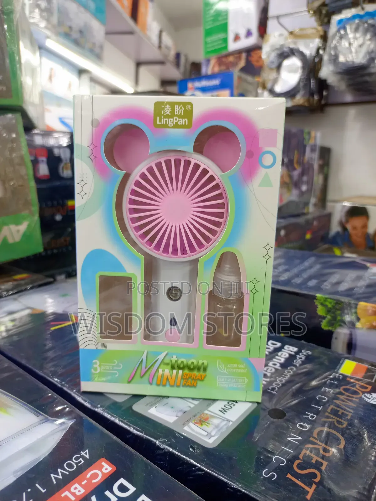 Portable Mini Fan With a Mist Spray Function.