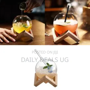 Spherical Cocktail Glass Cup With a Wooden Stand and a Straw
