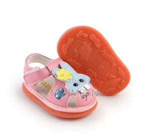 Infant Sandals With Rubber Soles and a Cartoon Rabbit Decoration.