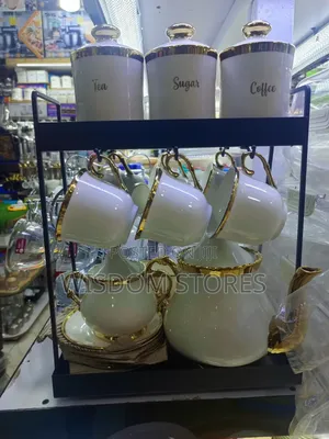 Ceramic Coffee and Tea Set With a Storage Rack.