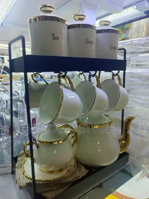 Ceramic Coffee and Tea Set With a Storage Rack.