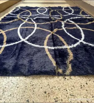 Patched Orange Fluffy Carpet