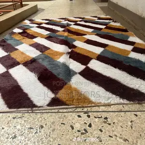 Patched Orange Fluffy Carpet