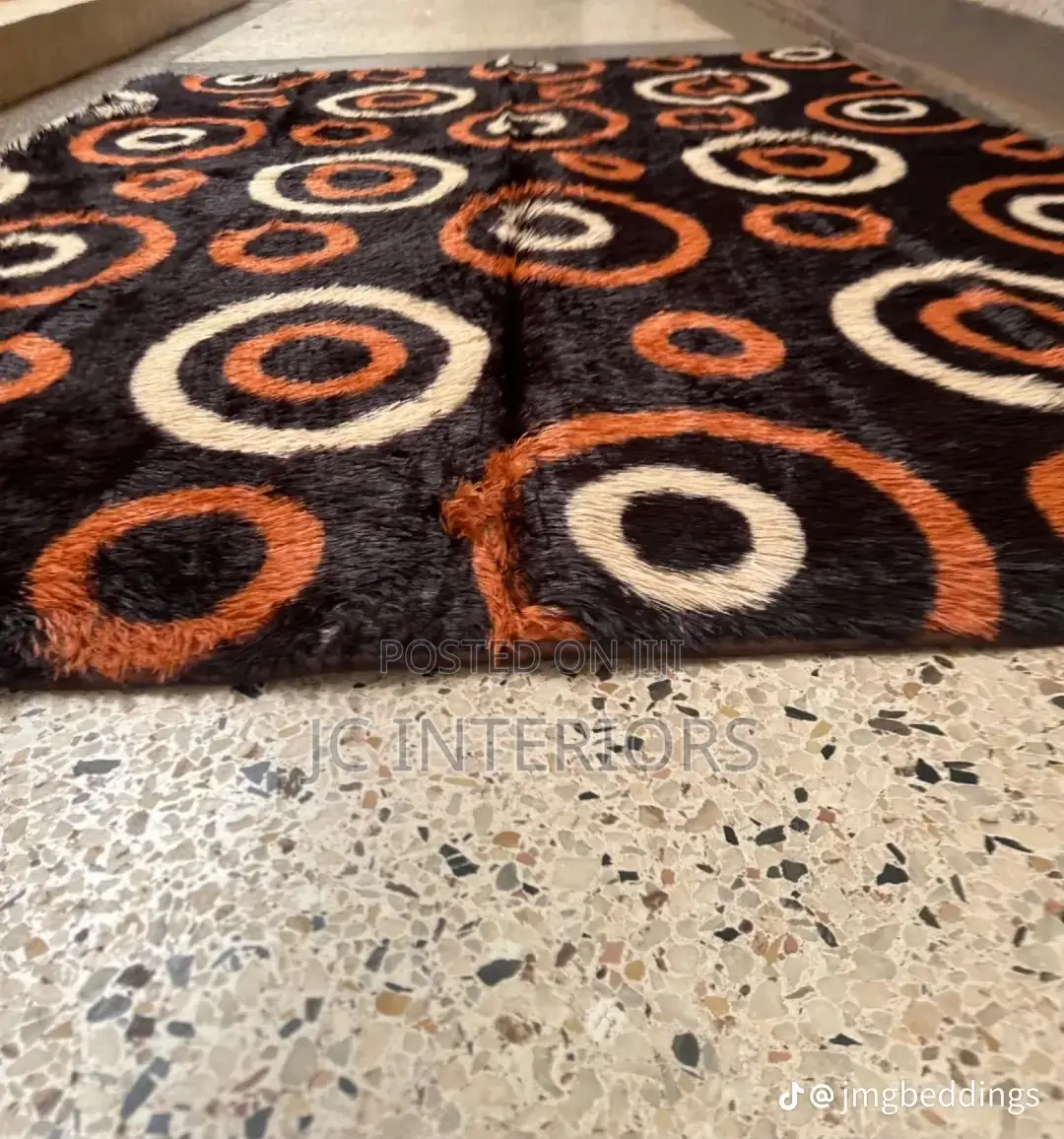 Patched Orange Fluffy Carpet