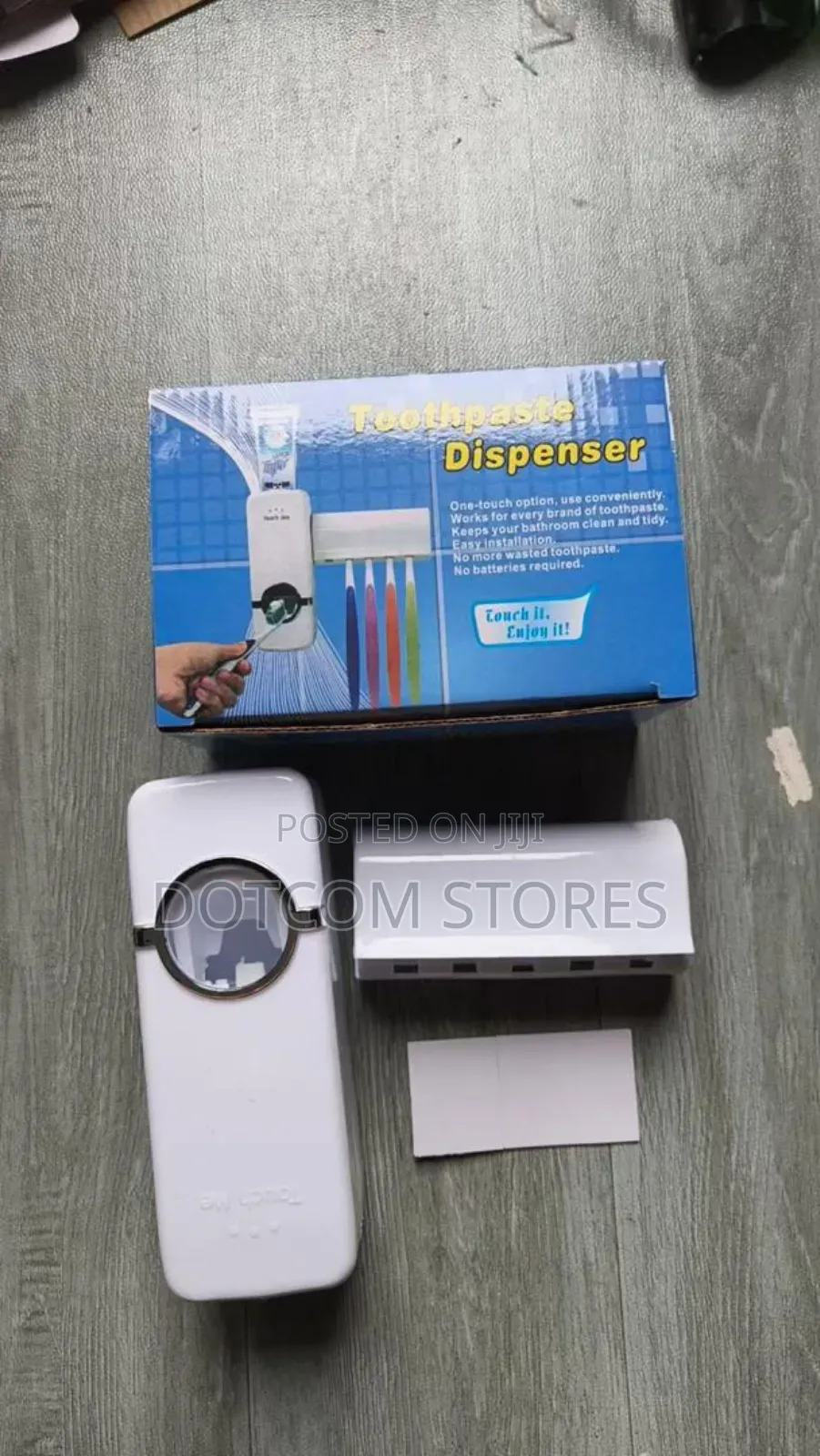 Automatic Wall-Mounted Toothpaste Dispenser.