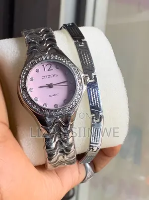 Silver-Tone Women's Citzens Quartz Watch and a Matching Bracelet.