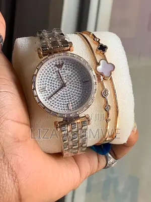 Women's Two-Tone Watch With a Crystal-Embedded Dial and Bezel