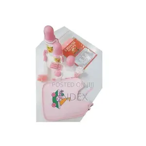A Set of Three Baby Bottles With Helpers -