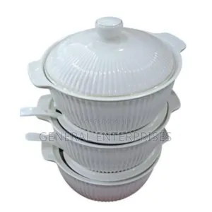 Set of Three White Ribbed Ceramic Serving Bowls With Lids.