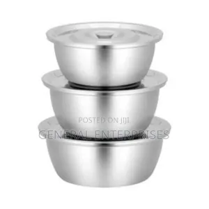 Set of Nesting Stainless Steel Mixing Bowls With Lids.