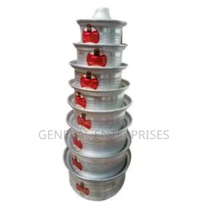 Set of Seven Pure Aluminum Saucepans With Covers.