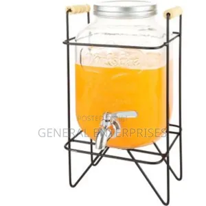 Glass Beverage Dispenser With a Metal Stand and Spigot
