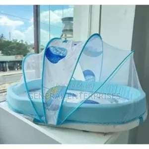 Portable Baby Crib With a Built-in Mosquito Net.