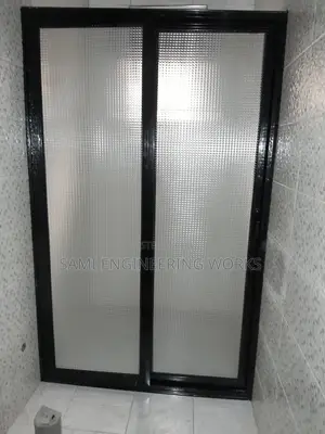 A Black Slidding Shower Divider Aluminum
