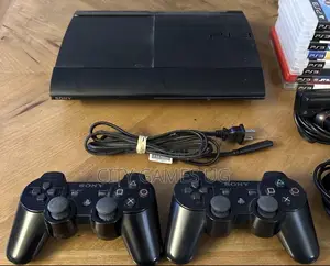 Sony Playstation 3 Ps3 Super Slim Console 2 Controllers 15 Games