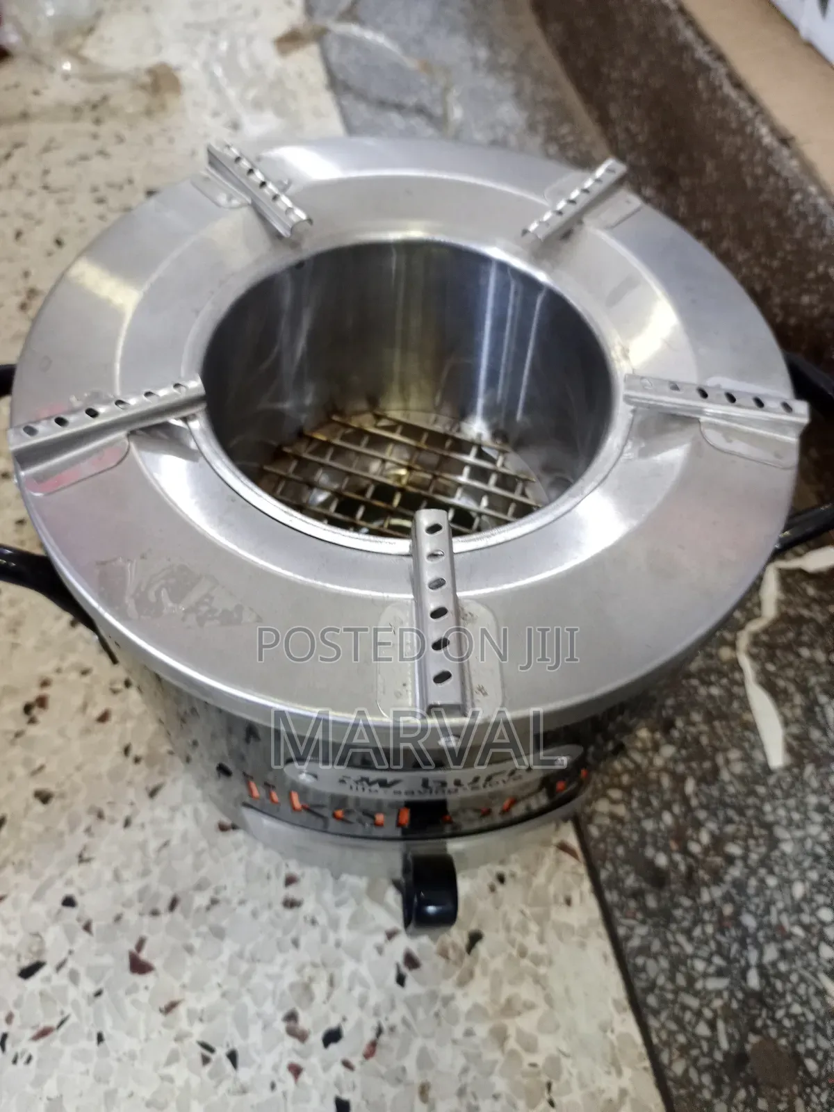 Burn Jikokoa High-Efficiency Charcoal-Saving Stove.