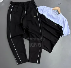 Lacoste Tracksuit Black Track Pants With White Piping Details.