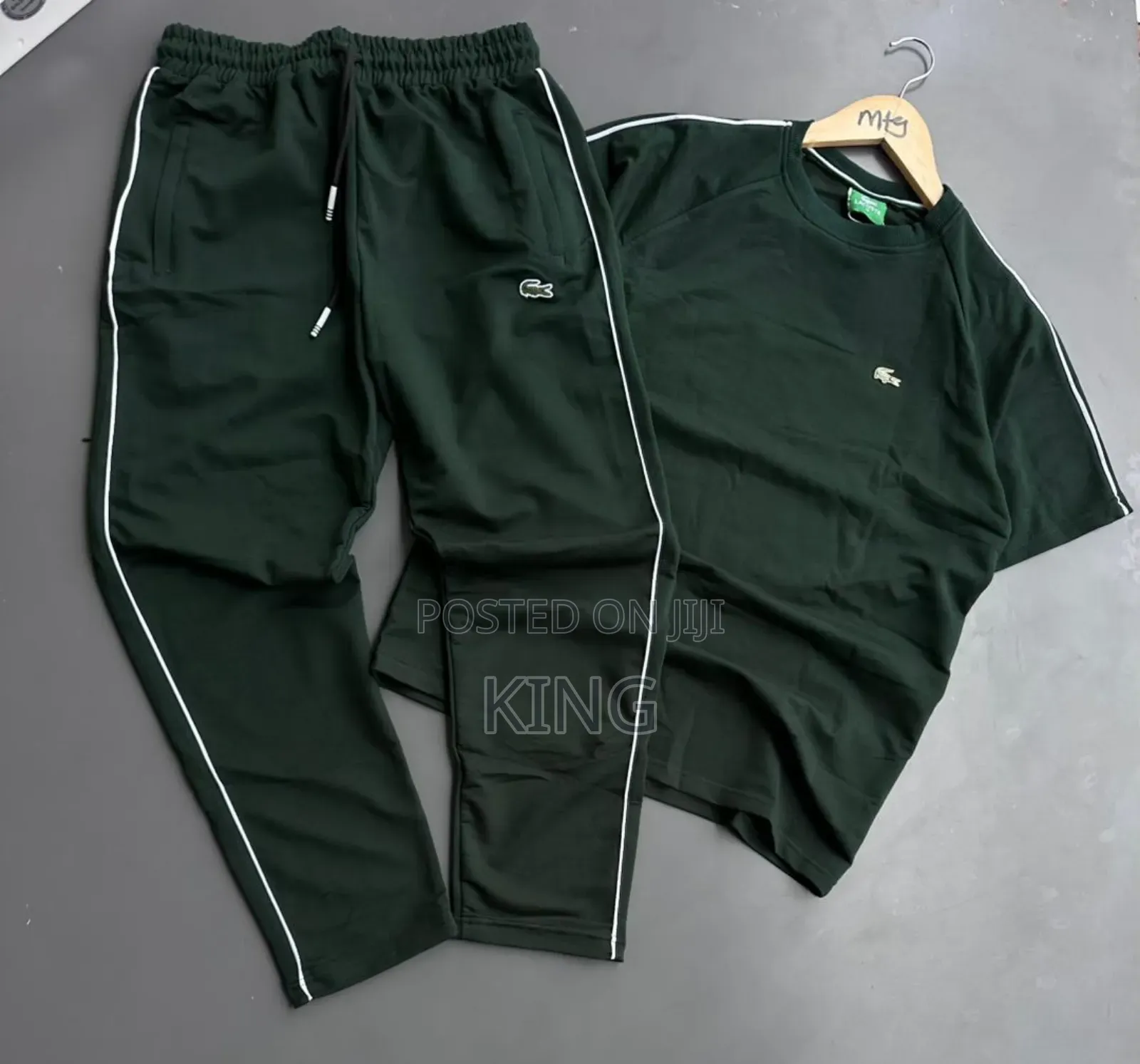 Lacoste Tracksuit Black Track Pants With White Piping Details.