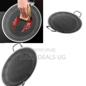 A Stainless Steel Round Griddle Pan