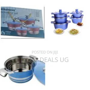 Multiple Pots With Lids and a Blue Exterior Finish.