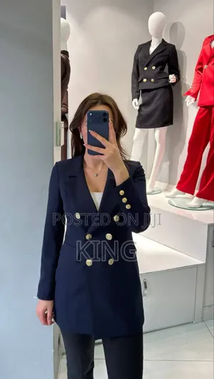 Women's Double-Breasted Blazer With Gold-Toned Buttons.