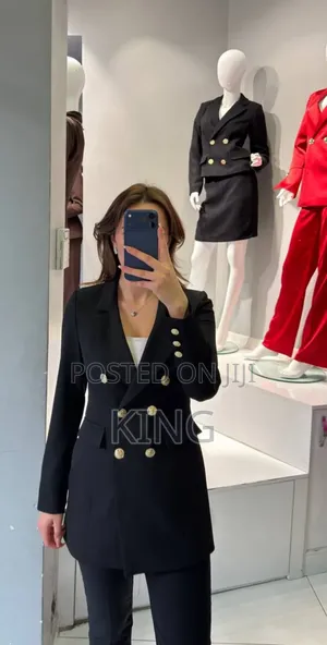 Women's Double-Breasted Blazer With Gold-Toned Buttons.