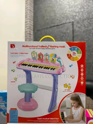 Children's Electronic Piano Keyboard Toy With a Stool and Microphone.