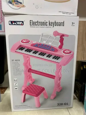 Children's Electronic Piano Keyboard Toy With a Stool and Microphone.