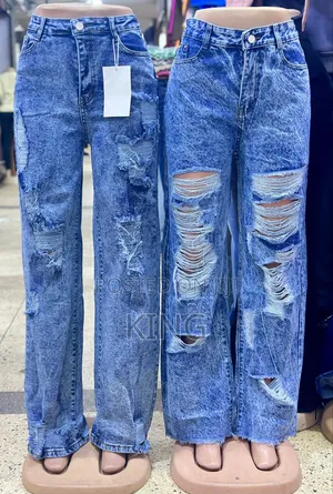 Women's Blue Distressed Denim Jeans.