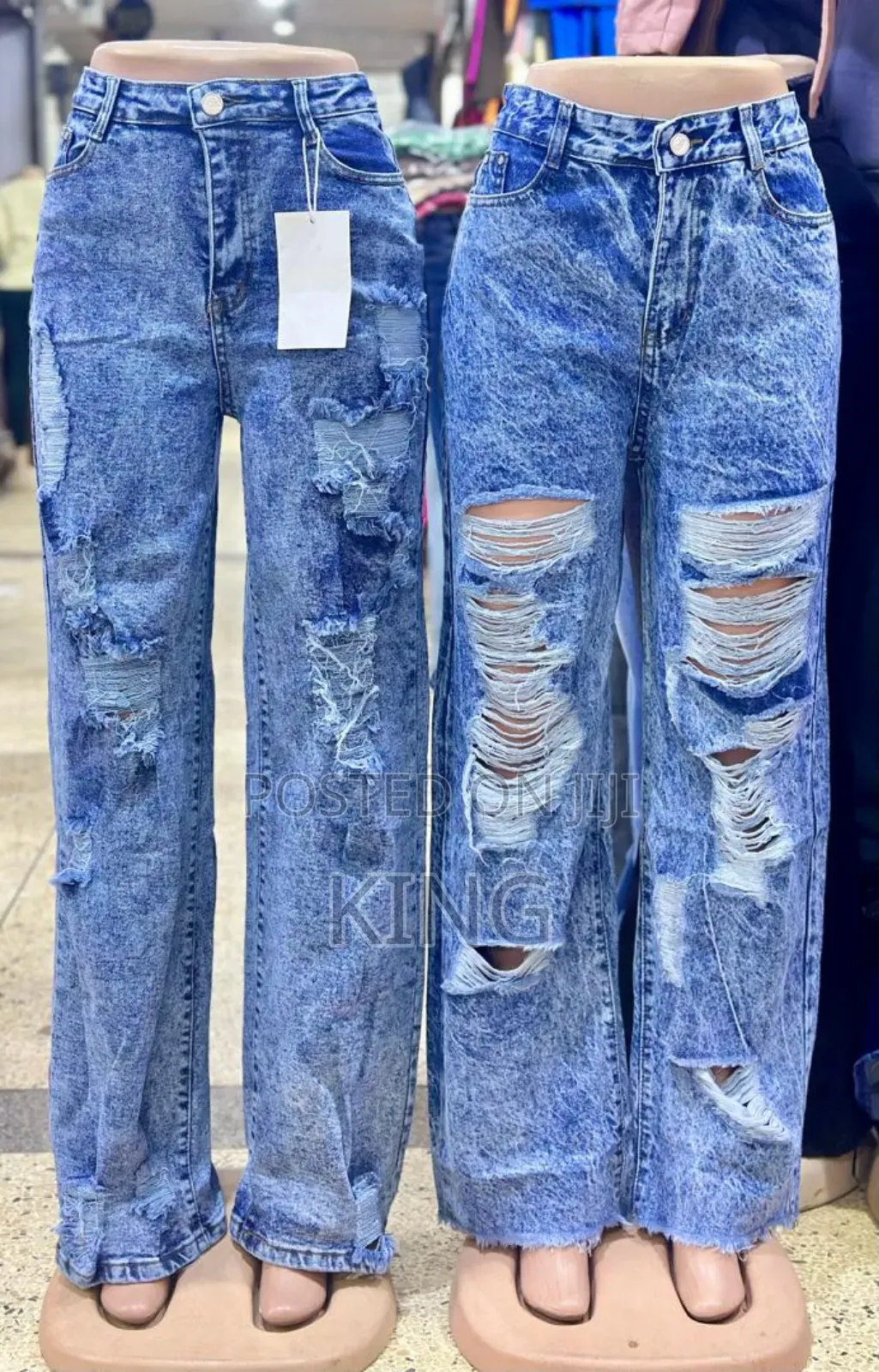 Women's Blue Distressed Denim Jeans.
