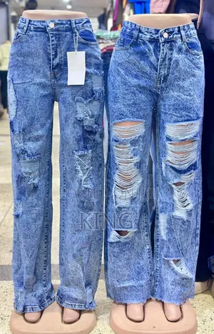 Women's Blue Distressed Denim Jeans.