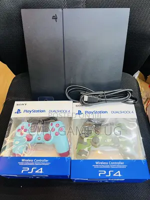 Sony Playstation 4 Black Console With Controllers and Cables