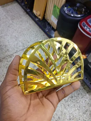 Gold Metal Napkin Holder.