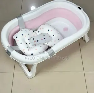 A Foldable Baby Bath Tub With A Support Cushion