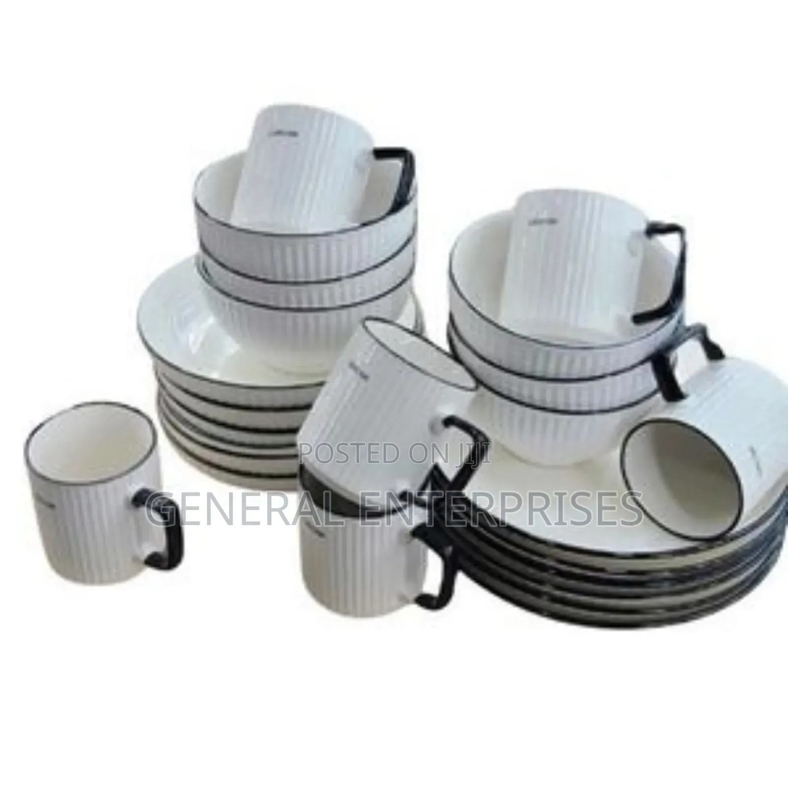 24-Piece Cream Ceramic Dinner Set With a Black Line Design.