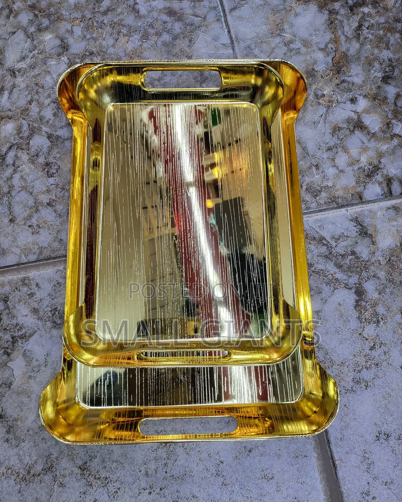 Gold-Toned Metal Serving Trays.