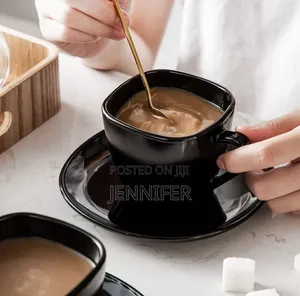 12- Piece Black Opal Glass Coffee Cup and Saucer Set.