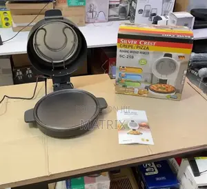 Silver Crest Electric Pizza Maker.