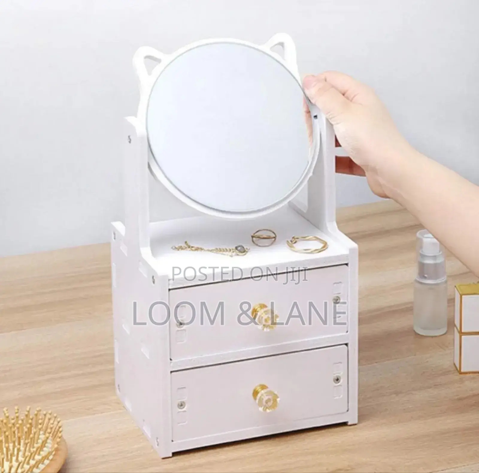 Cosmetic Organizer With a Rotating Mirror and Two Drawers