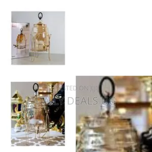 Generic Elegant Glass Beverage Dispenser With a Gold-Tone Stand